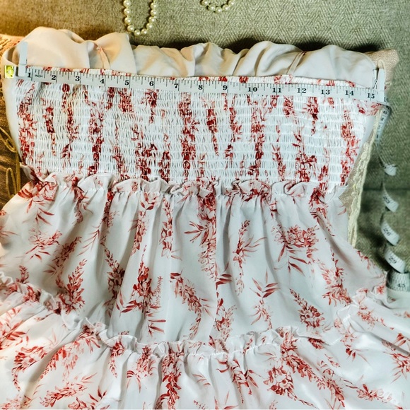 White dress with red detail. Adjustable tie straps with gold accent beads. - Picture 7 of 8